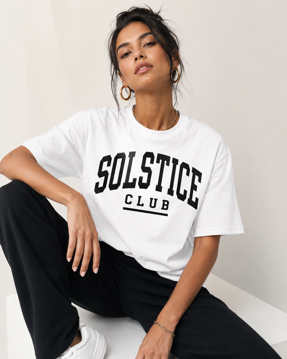Women wearing a white 240 GSM regular fit cotton T-shirt with crew neck and short sleeves